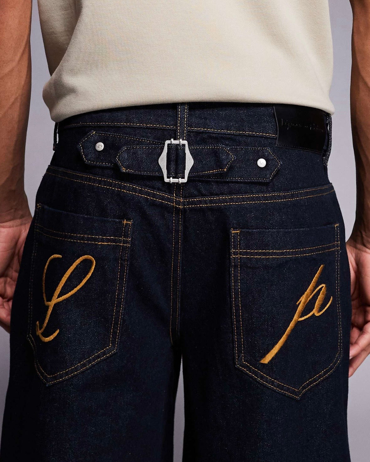 Liquor N Poker cinch turn up Baggy denim jean in Darkwash Blue